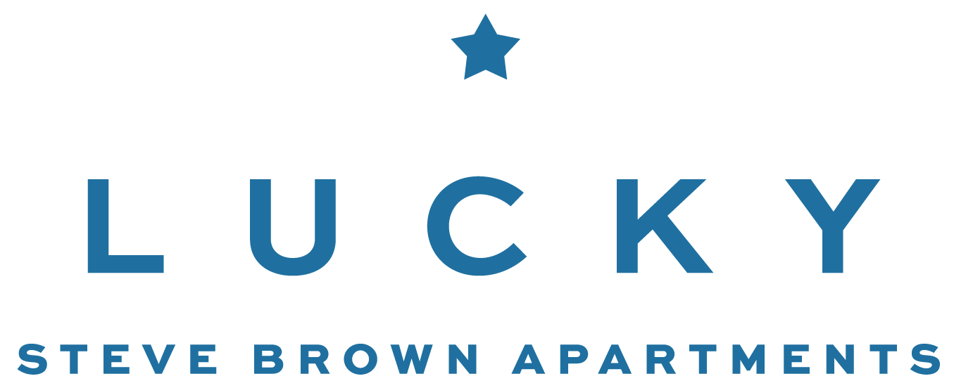 Lucky Steve Brown Apartments logo with a blue star above the word LUCKY.